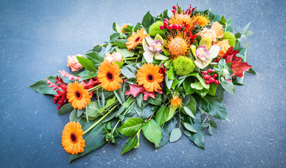 Flower arrangement. Grave flowers.