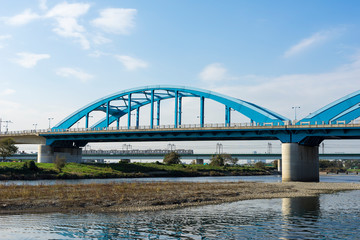 Obraz premium landscape of iron bridge over Tama River