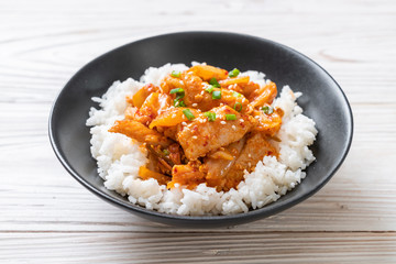 stir-fried pork with kimchi on topped rice