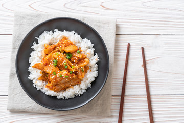 stir-fried pork with kimchi on topped rice