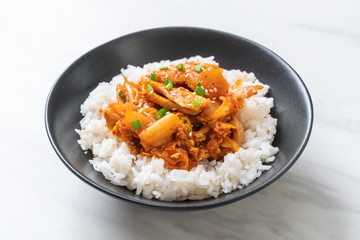 stir-fried pork with kimchi on topped rice