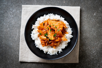 stir-fried pork with kimchi on topped rice