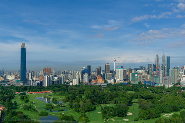Fototapeta na wymiar KUALA LUMPUR, MALAYSIA - 11th NOV 2018; Morning view over Kuala Lumpur, capital of Malaysia. Its modern skyline is dominated by the 451m tall KLCC, a pair of glass and steel clad skyscrapers.