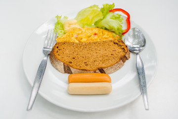 Omelette, sausages, breads and salads are good for breakfast.