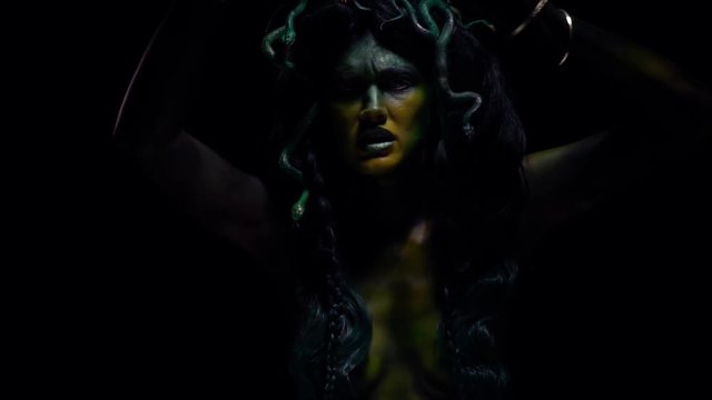 Screaming Medusa Gorgon on black background