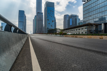 city road through modern buildings in Shenzhen