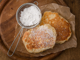 fresh pancases with powdered sugar