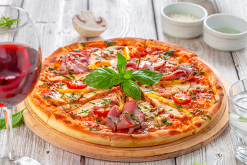Delicious fresh pizza served on wooden table