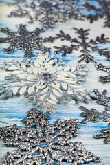 Christmas snowflakes on blue  background.