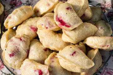 Traditional dumplings with cherry at a street food festival