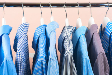 Cloth Hangers with Shirts. Men's business clothes. Fashion