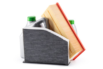 Car filters and motor oil can isolated on white