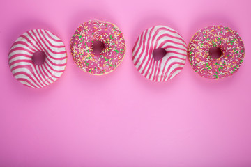 Donut on a pink background.