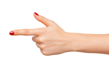 Woman's hand points a finger at something isolated on white background