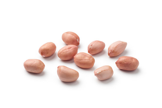 Raw peanuts isolated on white background