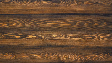 Natural toned wooden planks made of larch.
