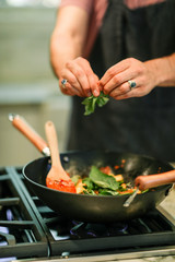 Chef cooking up a vegan pasta dish