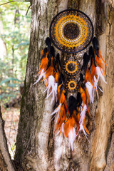 Handmade dream catcher with feathers threads and beads rope hanging