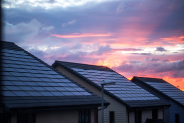 Solar roof eco housing during sunset