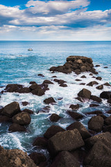 Fototapeta na wymiar Rocks in the ocean on the coast of Biarritz, France