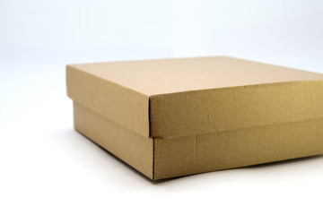 cardboard box with lid lies on white background in different angles