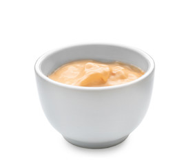 Tasty sauce in bowl on white background