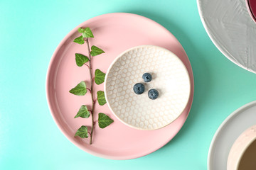 Plates on turquoise background