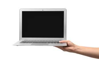Female hand holding laptop  with blank screen isolated on white