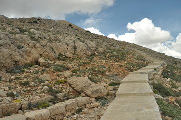 Nemrut Dagi. Mountains on the background of sky. Vertices covered with snow. Tourism and travel.