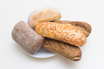Assortment of baked bread on a plate.