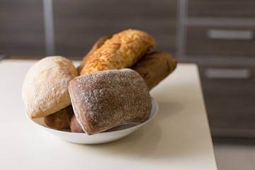 Assortment of baked bread on a plate.