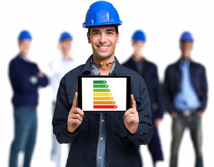 Engineer showing a power efficiency rating scale on a tablet