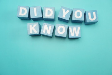 Did You Khow with blue building blocks top view flat lay on blue background