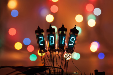 Happy new year is written with a lamp light. Radio electronic lamps. 2019. Original designed...