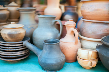 Fototapeta na wymiar ceramics clay dishes set pot dishes cups home production