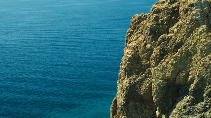 Mountain and sea. rocky cliff