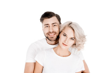 Fototapeta premium Attractive young adult couple hugging isolated on white
