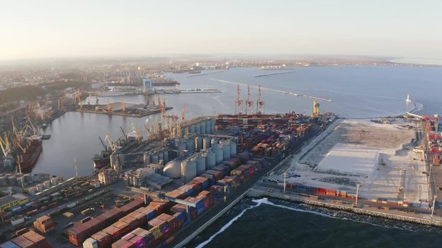 Beautiful drone aerial footage of the Odessa sea port during sunset