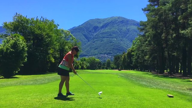 Golfer on the Golf Course with Driver in Ascona, Switzerland.