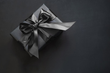 Gift box in black. Top view and copy space.