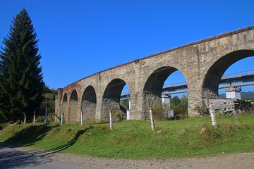Fototapeta na wymiar Old railway viaduct in Ukraine.