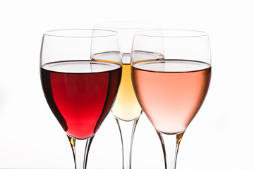 Red, white and rose wines on white background