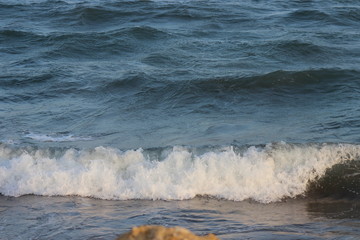 waves breaking on beach