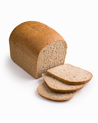 loaf of brown bread sliced on white background