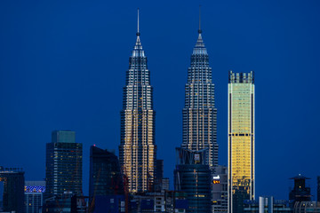 KUALA LUMPUR, MALAYSIA - 11th NOV 2018; First light over Petronas Twin Towers,  a pair of glass and steel clad skyscrapers (451m). 