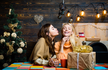 Funny girls and friendship concept. Group of friends celebrating new year and merry Christmas. Christmas wishes come true if you believe.