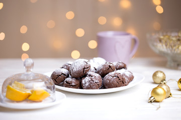 Chocolate brownie cookies in powdered sugar. Chocolate Crinkles.