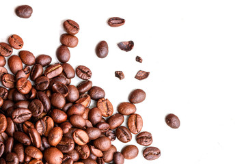 Roasted coffee beans isolated on a white background.