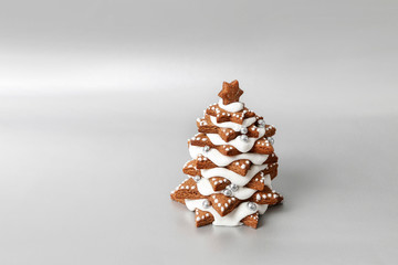 Gingerbread Christmas tree on silver background