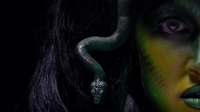 Medusa Gorgons stare in slow motion, close up